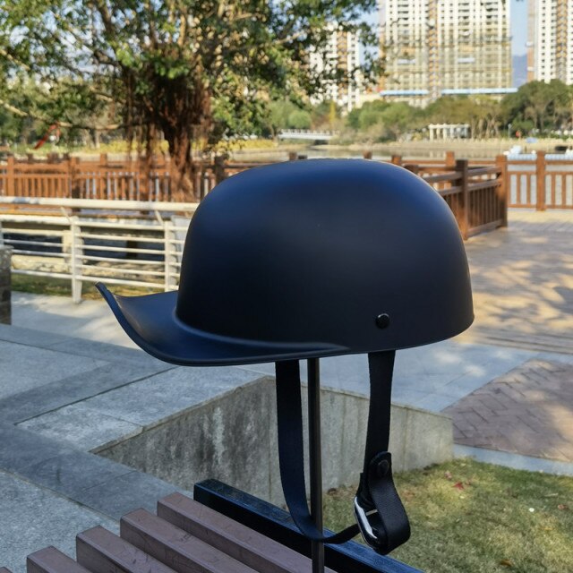 This Bike Helmet Looks like a Baseball Cap, is the Size of a Water